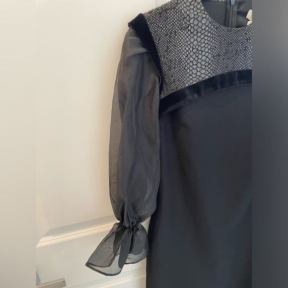 Shanis black long sleeve knee length dress. Poof detail at cuff. - Picture 3 of 6